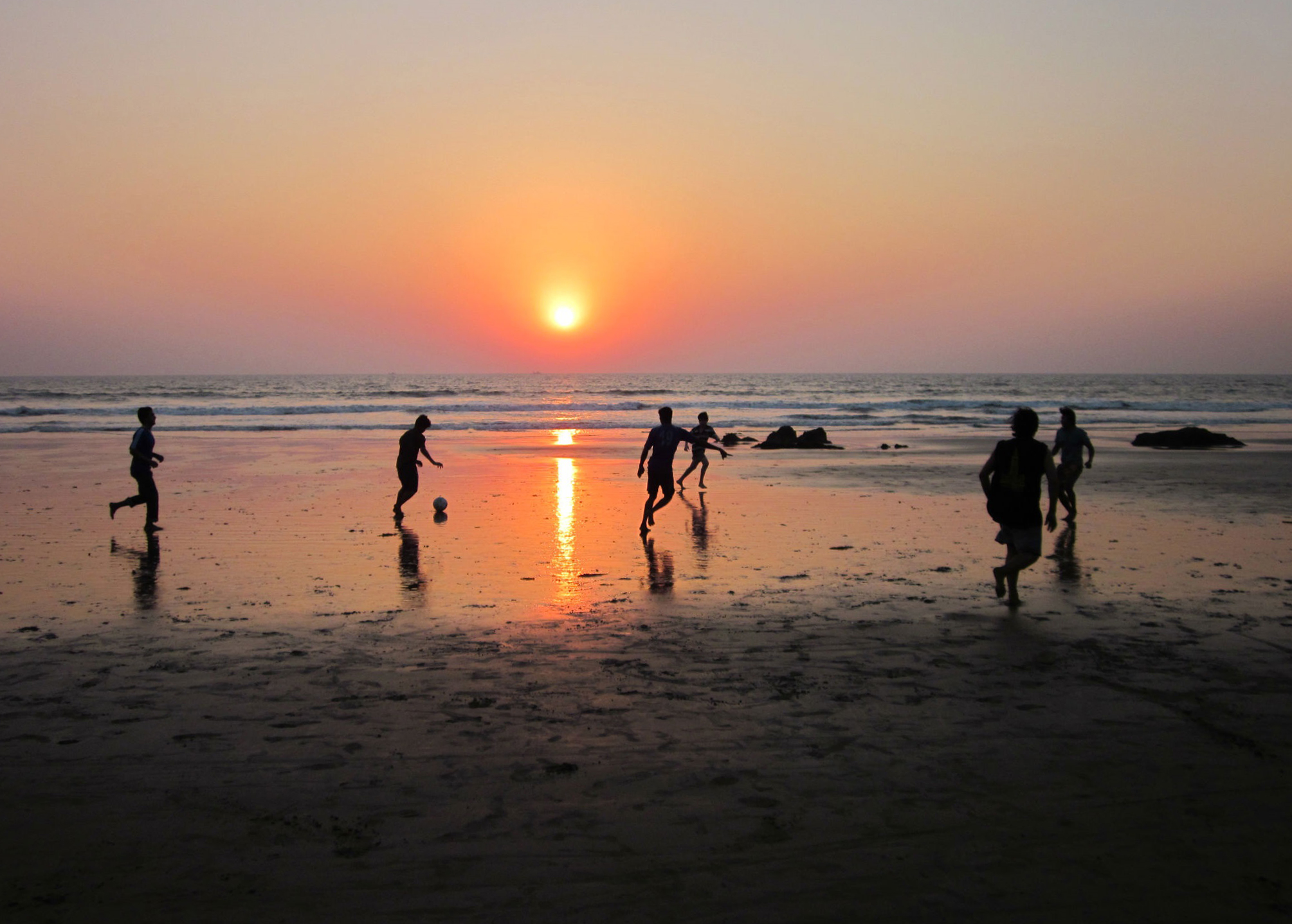 Zonsondergang aan zee